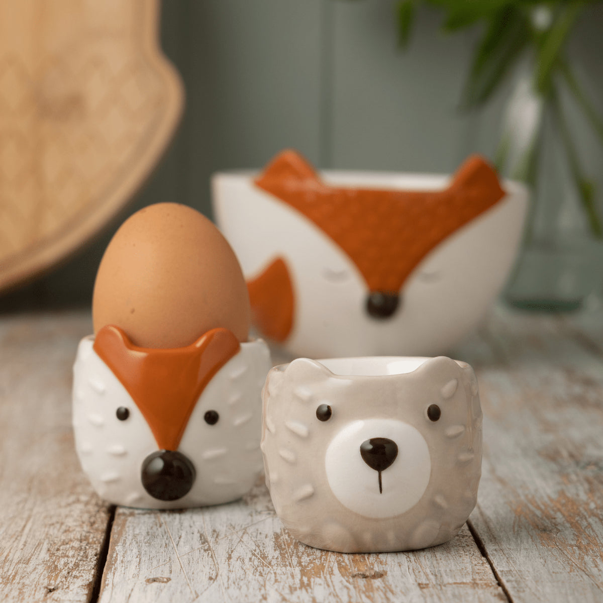 Woodland animals egg cup set. Featuring a hand painted fox and hedgehog.